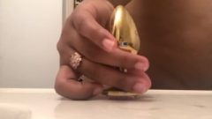 Fitting Anal Plug In Enormous Booth